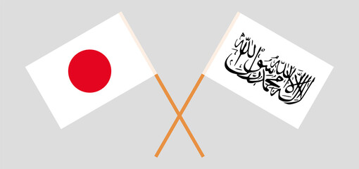 Crossed flags of Japan and Islamic Emirate of Afghanistan. Official colors. Correct proportion