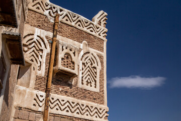 Dar al-Hajar in Wadi Dhahr, a royal palace on a rock. one of the most iconic Yemeni buildings. traditional Yemeni heritage architecture design details in historic Sanaa town and buildings in Yemen.