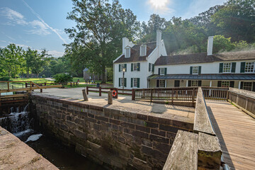 The Great Falls Tavern Visitor Center at Chesapeake and Ohio Canal National Historic Park. - obrazy, fototapety, plakaty