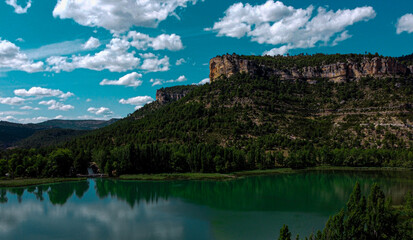 Fototapeta na wymiar lake in the mountains blue sky horizontal landscape green lake