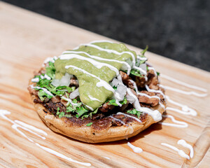 Appetizing Mexican sope with meat.