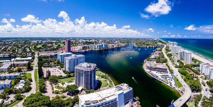 aerial drone panorama of lake Boca Raton, Florida with boats and city
