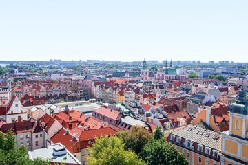 Fototapeta na wymiar The roofs are red of the old city, the historical center of Poland. View from height