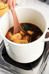 Selected Focus Cooking Process Making Kolak Pisang, Favorite Banan COmpote for Ramadan breakfasting