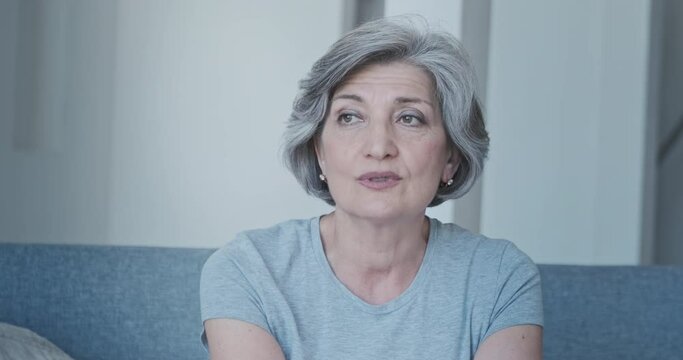 Grandmother communicating with her grandchildren on a video call. An elderly woman is interviewing for a job. Senior mature old blogger is telling her subscribers about experiences and practices.