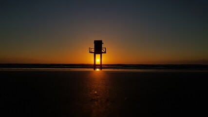 silhouette of a person at sunset
