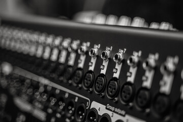 Audio mixing console, rear panel with outputs jack.