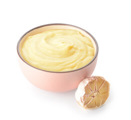 Bowl of tasty mashed potatoes with garlic on white background