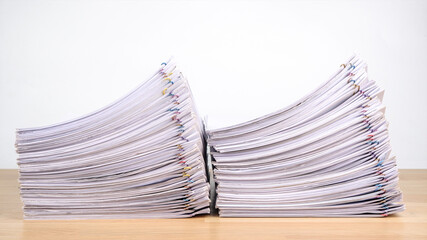 Stack of business paper on wooden desk,  job interview and busy business concepts, Document pile on office desk, Overload work, Hard work, pile of papers.