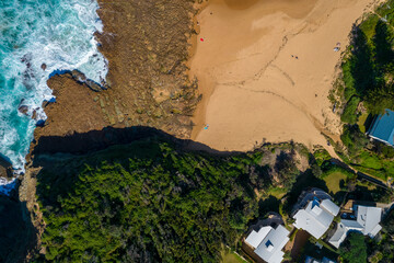 Blue ocean with large waves crashing on to North Avoca Shoreline in  New South Wales Australia