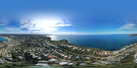 360 degree images of Australian ocean coastline with blue skys and ocean waves below.  NSW Australia 