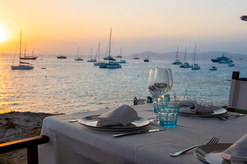 Fototapeta premium Luxurious restaurant on the Island of Formentera in the summer of 2021 with sunset views.