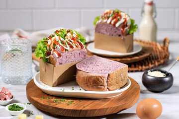 Korean Sandwich Purple Bread (Egg Drop) with Egg, Lettuce, Mayonaise, Sauce. Served with Milk....