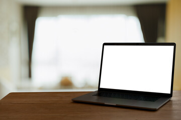 laptop with blank screen with bokeh background