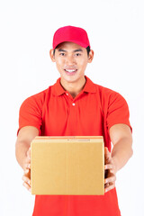 Delivery man employee in red cap blank t-shirt holding a parcel box And he used hand to give a thumbs up like icon isolate on white background ,showing company excellence , transporting goods employee