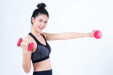 Fototapeta premium Fitness Asian woman doing working push up with weights dumbbells , Beautiful cute girl beauty sexy woman smile in sportswear exercising - isolated on white background