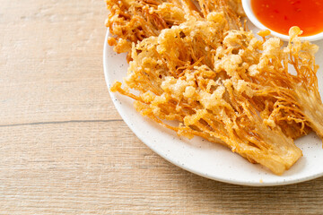 deep fried enoki mushroom or golden needle mushroom with spicy dipping sauce