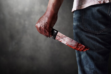 Serial killer with bloody knife