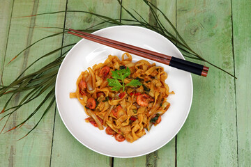 Asian food, flat noodle with prawns