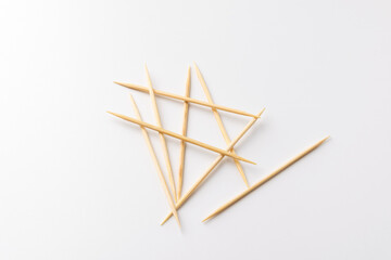 wooden toothpick on a white background