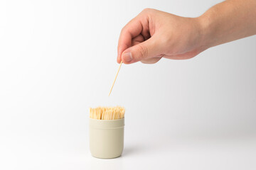 wooden toothpick on a white background