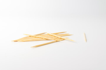 wooden toothpick on a white background
