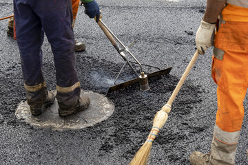 Paving a road with porous asphalt for traffic noise reduction in Geneva, switzerland.	