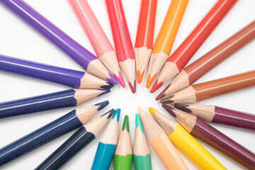 Color pencils in arrange in wheel colors