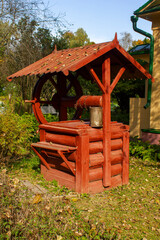 old wooden well with spring water in the Russian village