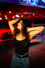 Night portrait of a charismatic girl