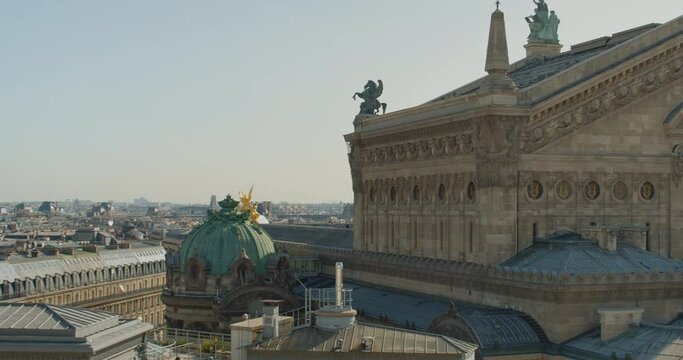 Exterior View Of Opera Garnier (Palais Garnier) With Sculptures Atop On Building In Paris, France. - wide panning