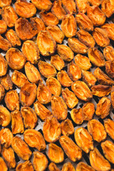 The process of home cooking dried fruits in an electric dryer.