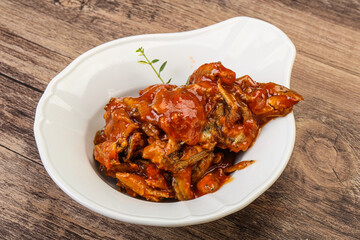 Canned anchovy in tomato sauce