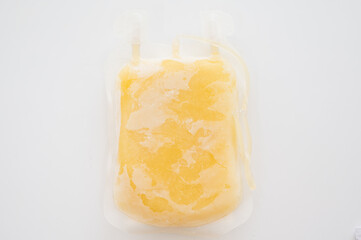 Fresh frozen plasma blood bags isolated on white background.Blood bank unit in laboratory.Medical...