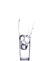 Water splash from glass on a white background. isolated