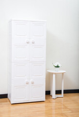 white plastic wardrobe in minimal style in the bedroom
