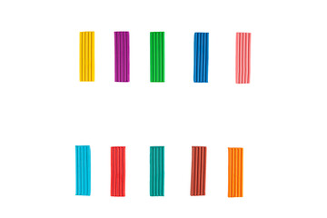 Set of multi-colored modelling clay isolated on white.