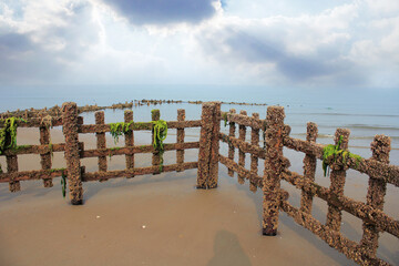 Fishing nets are tangled in facilities installed on the beach.