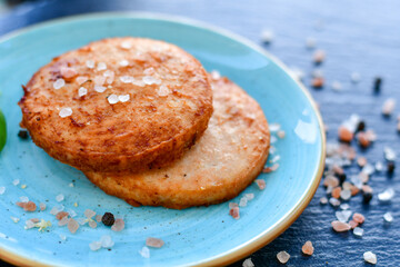 Homemade ketogenic  Salmon Burger with Tartar Sauce and  whole grain ketgenic bread. Healty food