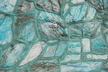 Beautiful emerald wall of stones, background. pattern