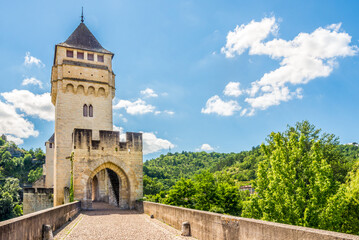 View at the Tower of Valentre bridge over Lot river in Cahors ,France - obrazy, fototapety, plakaty