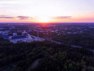 Obraz premium Panoramic view of the city of Helsinki from above at sunset
