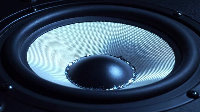 The Loud Speaker Vibrating stock video is a wonderful piece of footage that contains a close-up shot of a loud speaker vibrating from sound. 