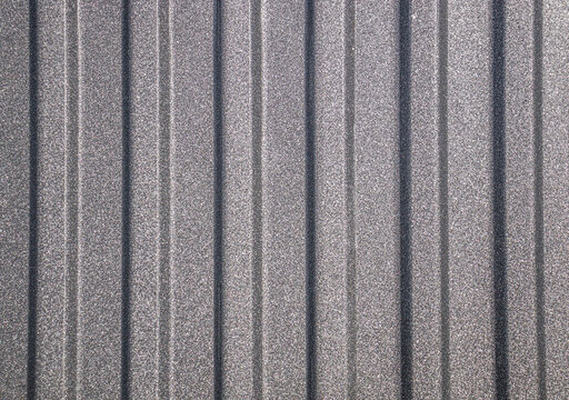 Painted metal profile as a background. Shagreen leather.