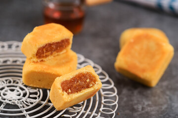Delicious Taiwan Pineapple Tart, Melted Pie Crust with Pineapple Jam Inside, Usually Come with Square or Rectangle Shape, Half Shape with Pineapple Jam Inside