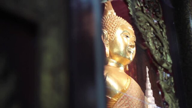 Colorful golden Asian Buddha images  Chiangmai Thailand