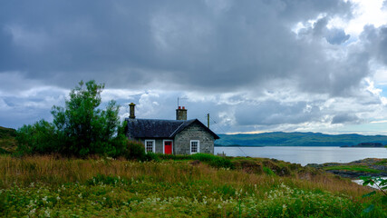 Fototapeta na wymiar Stormy skies over Sound of Jura, Corryvreckan and island from Craignish Point, Scotland