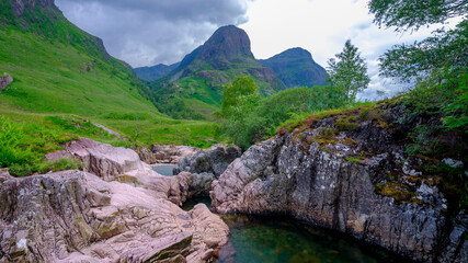 The Three Sisters of Glencoe with the waterfalls near the Study, Scotland