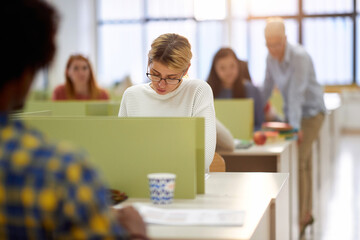 Female student focused on the lesson at a lecture