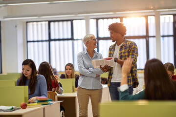 Female professor likes student interest in the lesson at the lecture